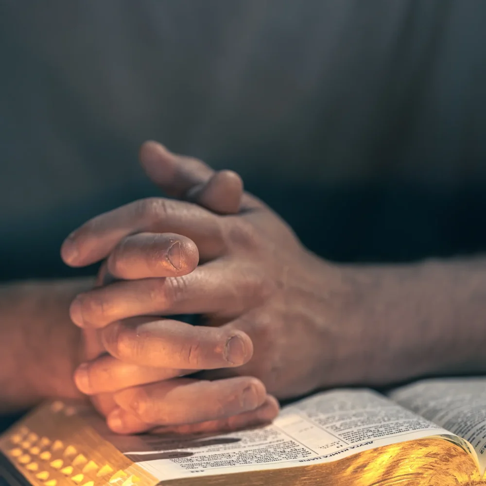 man-reads-bible-male-hands-with-bible-closeup